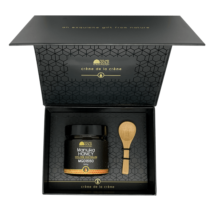 Premium Australian Manuka Honey MGO1550 box with wooden spoon