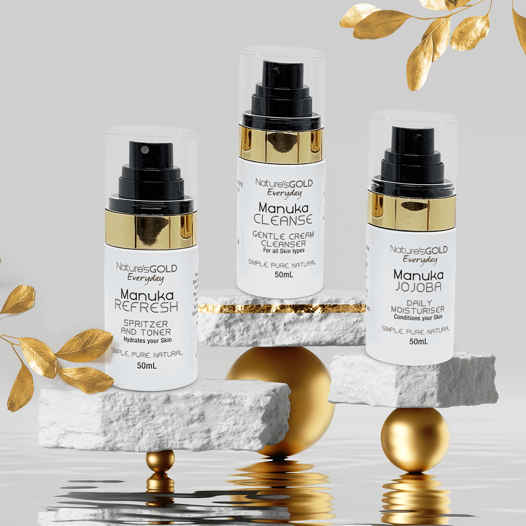 Nature’s Gold Everyday Skincare collection set balancing on stone 