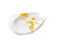 Image of white cream splatter with honey on white background