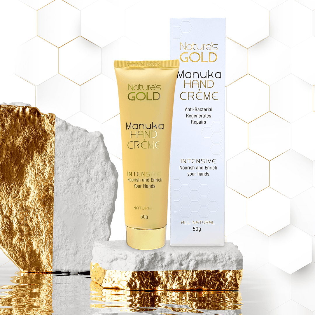 Natures Gold Manuka Hand Cream package on white and gold rocks 